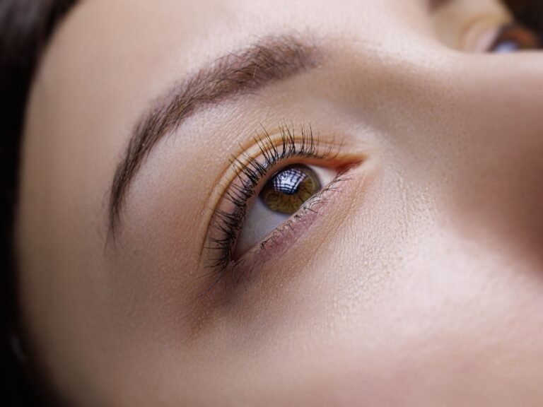 A natural lash line enhancement tattoo that subtly defines the eyes for a fuller lash appearance.